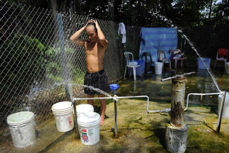Man Relaxing At Sembawang Hot Spring