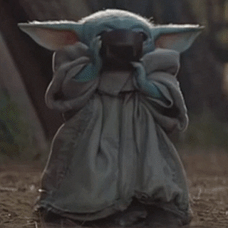 Baby Yoda Drinking Out Of A Cup