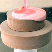 Icing a cake pink